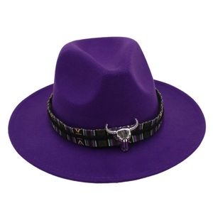 Detail of purple felt fedora hat featuring bohemian band and silver ox head metal buckle