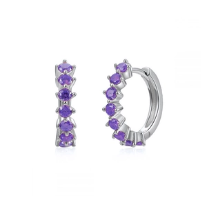 Detail of silver hoop earrings featuring micro-paved purple cubic zirconia stones