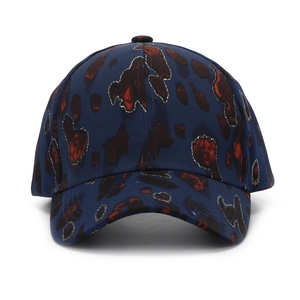 Deep blue leopard print baseball cap with gold glitter accents and curved brim
