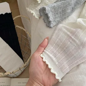 Women's breathable mesh crew socks with lettuce trim in neutral colors for daily comfort