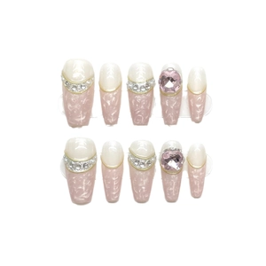 Pink marble press-on nails with luxury gems, French tips and golden glitter detailing