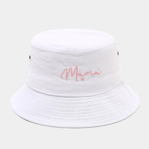 Close-up of white cotton bucket hat featuring pink Mama text and heart embroidery