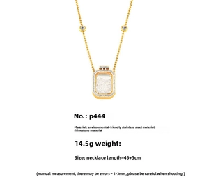Detail of gold perfume bottle pendant with rhinestones and product size specifications