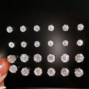 Set of 12 pairs six-prong titanium steel stud earrings with clear round zirconia stones