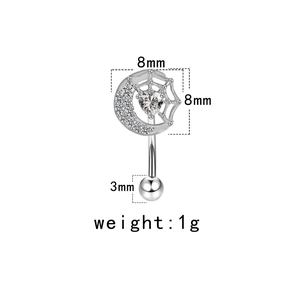 Macro detail of crescent moon and spider web eyebrow ring with 8mm size dimensions