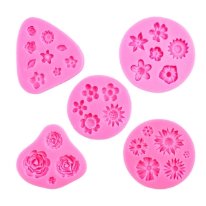 Set of 5 pink floral silicone molds for fondant flowers, leaves, and daisy decorations