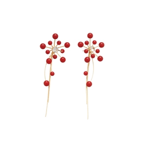 Flower pearl tassel earrings with red beads and zircon on white background