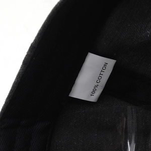 Close-up of the internal label showing 100% cotton fabric on this vintage baseball cap