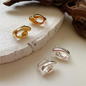 Minimalist 925 sterling silver twisted hoop earrings in gold and silver finish