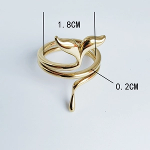 Detail showing gold whale tail ring dimensions with 1.8cm diameter and 0.2cm band width