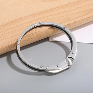 Foldable circular silver stainless steel bag hook with brushed metal finish