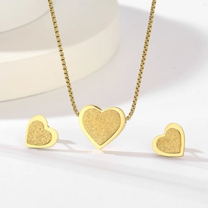 Minimalist gold star heart jewelry set with matte finish necklace and stud earrings