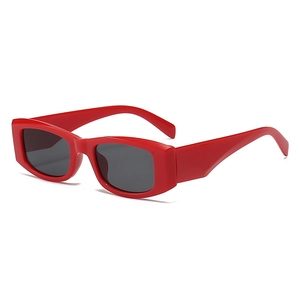 Retro red rectangular thick frame sunglasses with dark lenses shown in a 45-degree angle