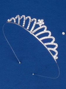 Close-up of silver crown headband with sparkling white rhinestones and floral design