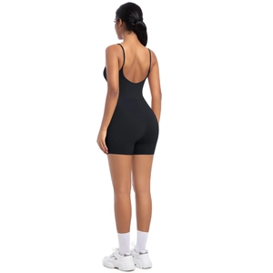 Deep U-neck open back detail on black high-stretch yoga bodysuit with slim straps