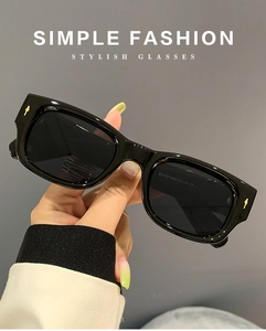 Close-up of rectangle sunglasses showing E5120 model specs and CE mark on the inner arm