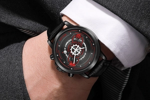 Close-up of industrial style men watch with black leather strap on suit sleeve