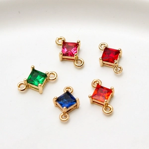 Macro detail of geometric cubic zirconia connector charms for handmade jewelry