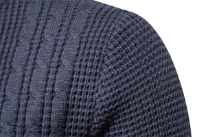 Detailed close-up showing navy blue waffle knit texture and fabric weave on shoulder