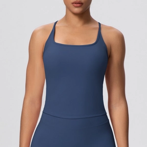 Detail of navy blue yoga tank top showing thin straps and square neckline texture