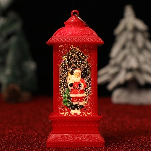 Detailed view of red Christmas lantern featuring Santa Claus and swirling glitter lights