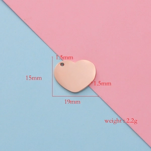 Detailed view of rose gold heart pendant with dimensions 15x19mm and weight 2.2g