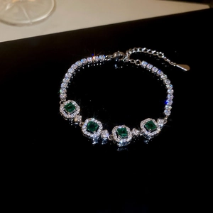 Elegant emerald green zircon flower bracelet with white diamonds on silver metal base