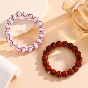 Detail view of woven sports bracelets featuring basketball and baseball bead designs
