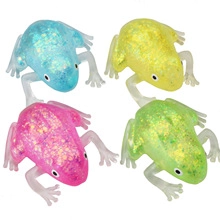 Set of four colorful glittery frog squishy stress relief toys with internal LED lights
