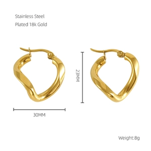 Detail showing 18k gold plated stainless steel twisted earrings, 30mm x 23mm size