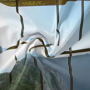Detail of artistic mountain landscape tapestry with modern geometric frames and silk texture