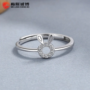 Close-up of 925 sterling silver rabbit ring featuring zircon-pave ears and adjustable band