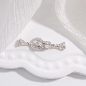 Macro detail of S925 sterling silver rectangular buckle with sparkling zircons for jewelry