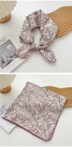 Detail of floral linen square scarf with purple botanical print and crochet edges