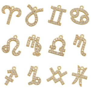 Lot de 12 pendentifs zodiaque dorés sertis de zircons en micro-pavage luxe