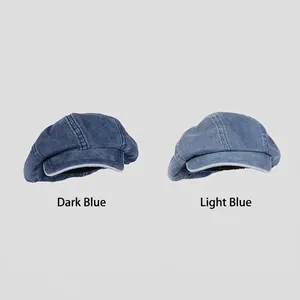 Retro denim newsboy caps in dark and light blue with stylish contrast stitching