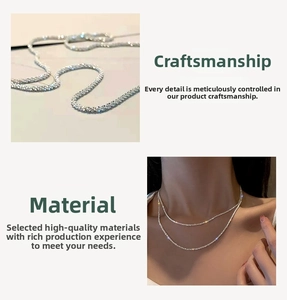 Close-up of a sparkling silver twisted titanium steel rope chain with a textured finish