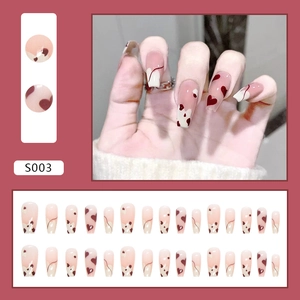 French ballerina press-on nails with red heart cow print and nude pink base