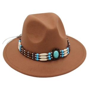 Close-up of bohemian felt hat featuring turquoise beads and ethnic patterned trim