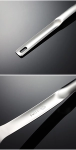 Detail of 304 stainless steel oil separator spoon handle with hanging hole and SUS304 stamp