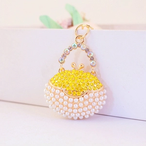 Creative handbag keychain with gold metal, rainbow rhinestones and white pearls pendant