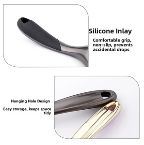 Detail view of the silicone inlaid handle and hanging hole of this ice cream scoop