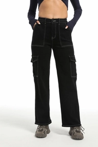 Detail of high waist cargo pants with contrast white stitching and large utility pockets