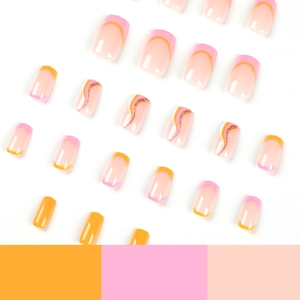 Pink and yellow French wave press-on nails with glitter accents on white background