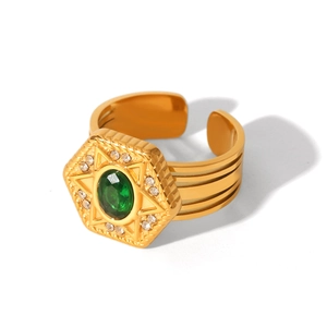 Irregular gold stainless steel ring with green oval moonstone and starburst setting