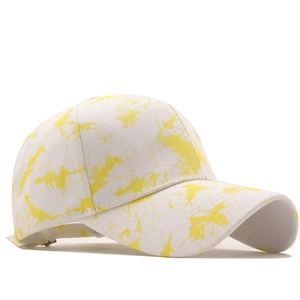 Unisex graffiti style baseball cap with yellow paint splatter print on white cotton