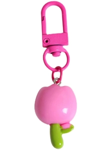 Close-up of pink tulip keychain featuring a green leaf pendant and metal clasp