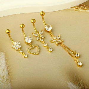 Set of four gold naval rings with zircon butterfly, heart and floral dangle charms