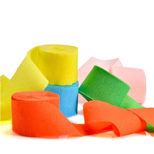 Colorful crepe paper rolls for party streamers and creative DIY background decorations