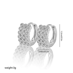 Detail view of silver zircon hoop earrings showing dimensions 1.2cm height and 0.6cm width